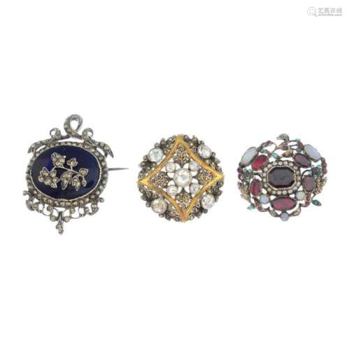 Four late Georgian to mid Victorian gem-set brooches.