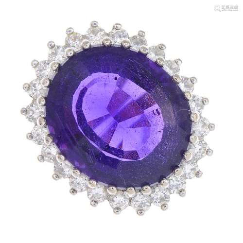 An amethyst and diamond cluster ring. Designed as an