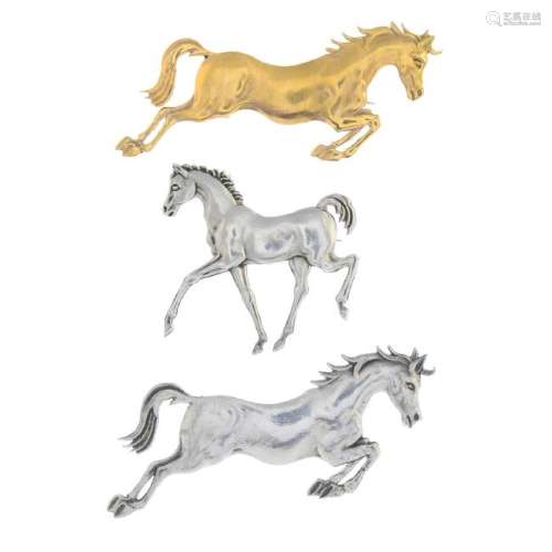 GEORGE TARRATT - a 9ct gold horse brooch and two silver