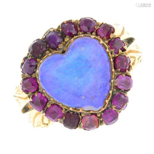 A mid Victorian gold opal and ruby dress ring. The