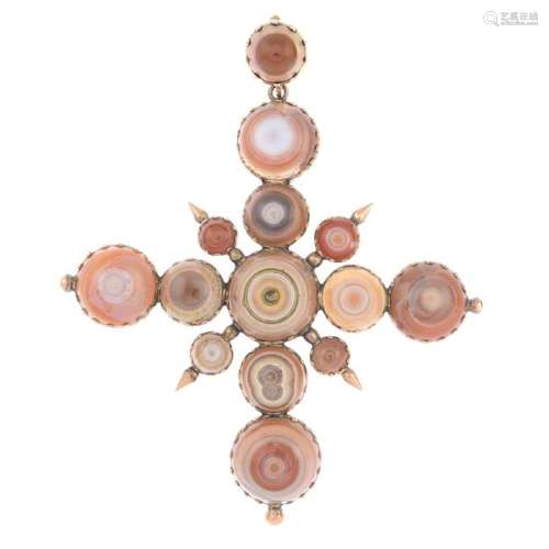 An agate cross pendant. The graduated circular-shape