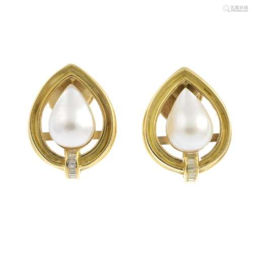 A pair of mabe pearl and diamond earrings. Each