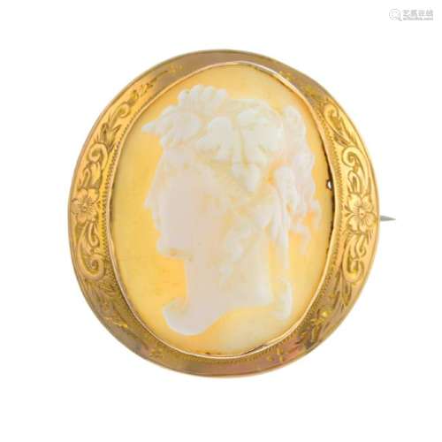 A mid 20th century cameo brooch. Of oval outline, the