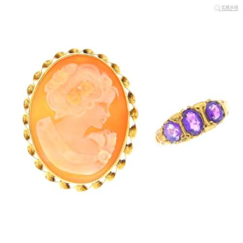 A 9ct gold amethyst ring and a cameo brooch. To include