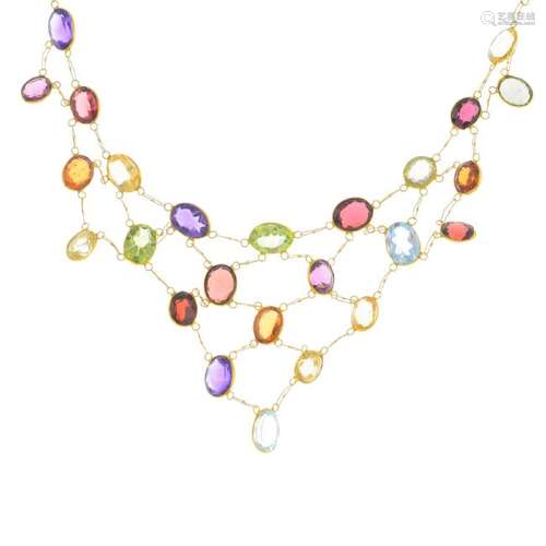 A gem-set necklace. Designed as an oval-shape vari-gem