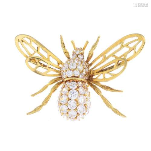 An 18ct gold cubic zirconia insect brooch. Designed as
