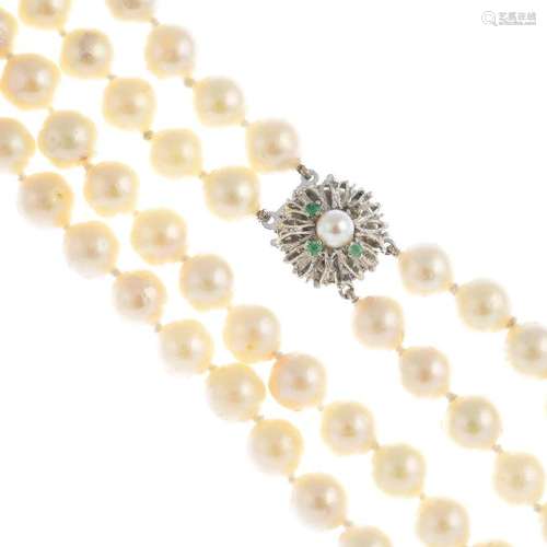 A cultured pearl two-row necklace. Comprising two rows