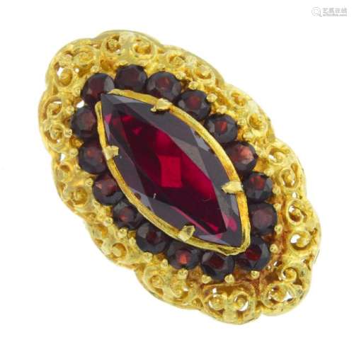 A synthetic ruby and garnet dress ring. The