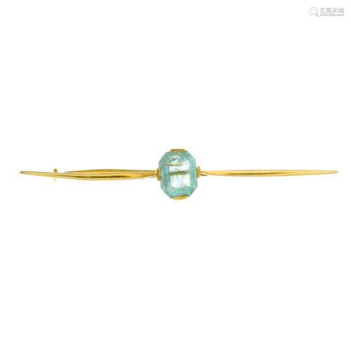 A beryl bar brooch. The rectangular-shape green beryl,
