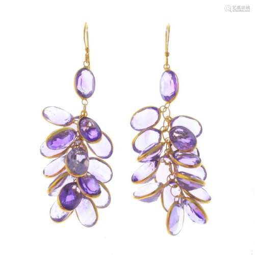 A pair of amethyst earrings. Each designed as a cluster