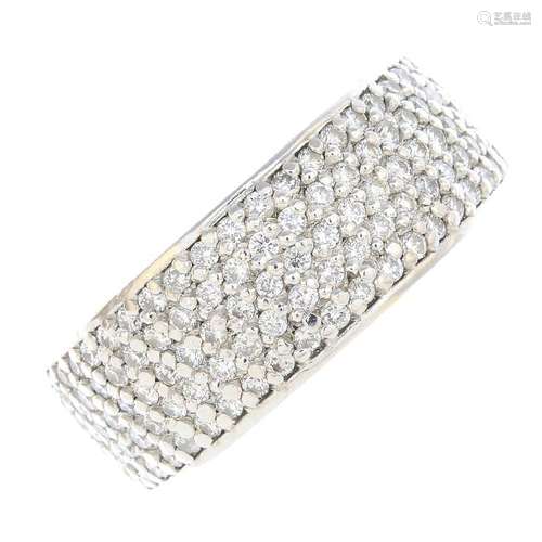 A platinum diamond half eternity ring. Designed as a