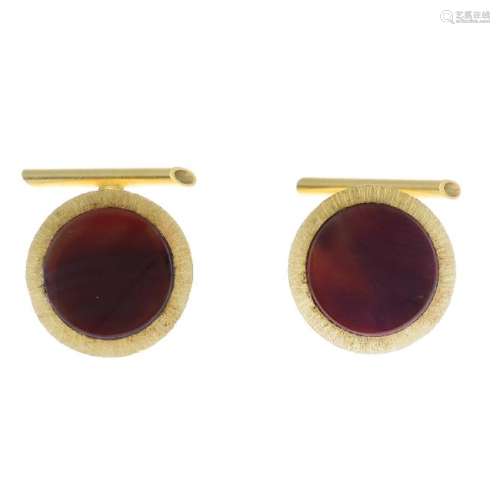 A pair of band agate cufflinks. Each designed as a