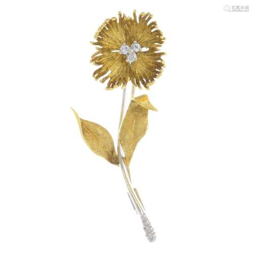 An 18ct gold diamond floral brooch. Designed as a