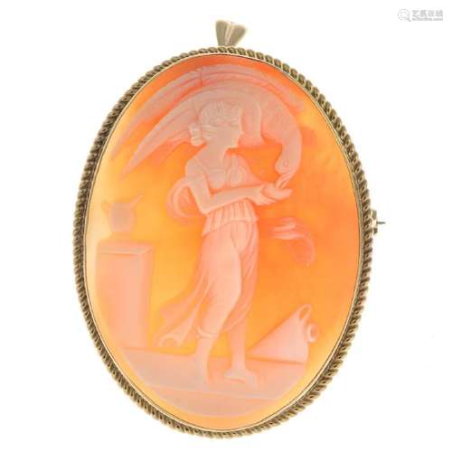 A 9ct gold shell cameo pendant. The oval shell cameo,