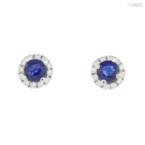 A pair of 18ct gold sapphire and diamond earrings. Each