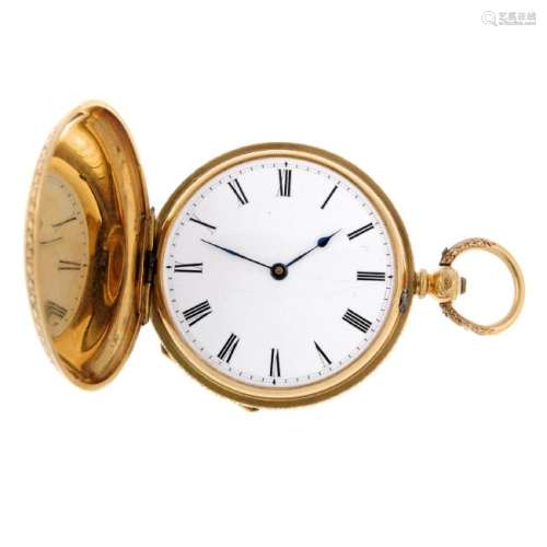 A full hunter pocket watch. Yellow metal case with