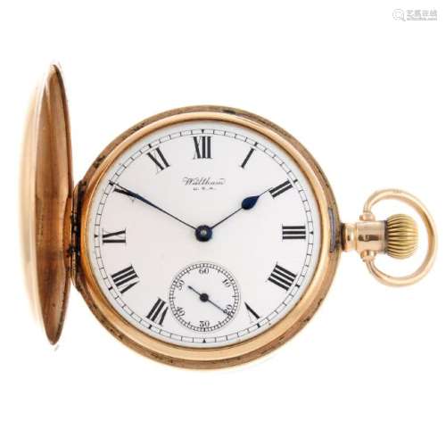 A full hunter pocket watch by Waltham. 9ct yellow gold