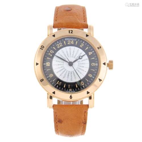 WALDAN - a gentleman's World Time wrist watch. 18ct