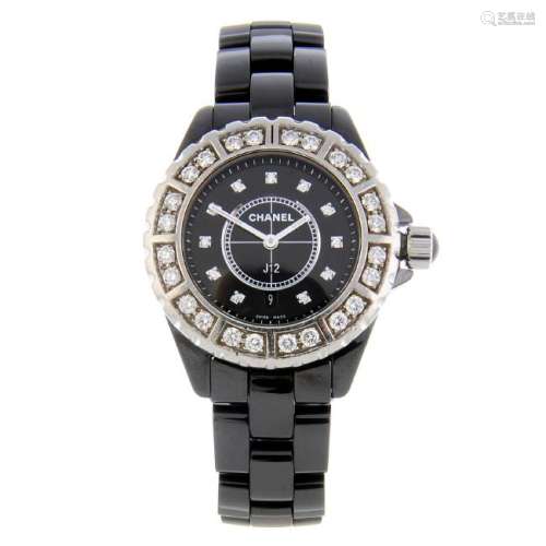 CHANEL - a lady's J12 bracelet watch. Ceramic case with