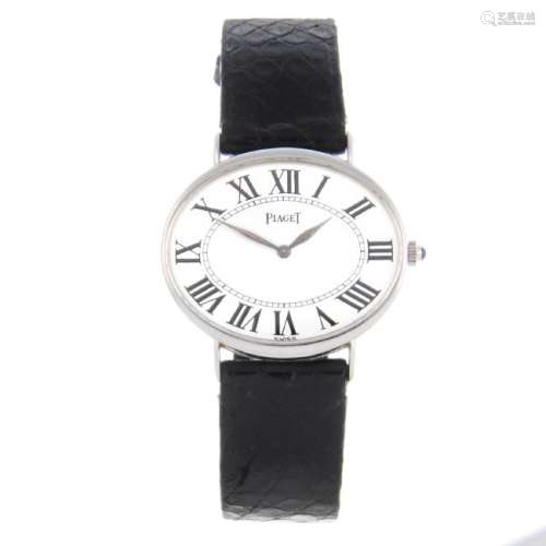 PIAGET - a wrist watch. White metal case, stamped