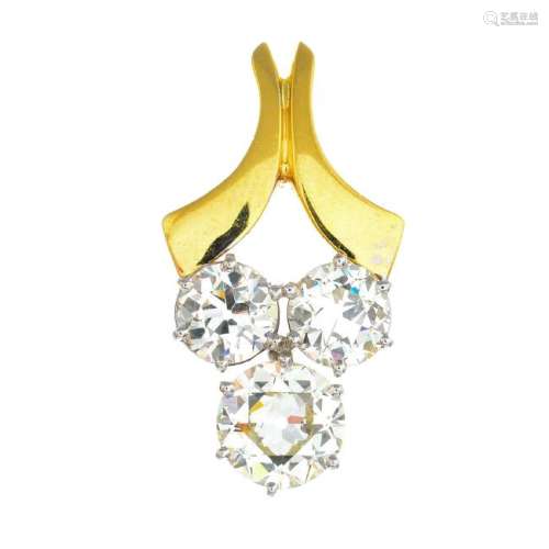 An 18ct gold diamond pendant. The circular-cut diamond