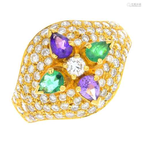 A diamond and gem-set ring. The brilliant-cut diamond,