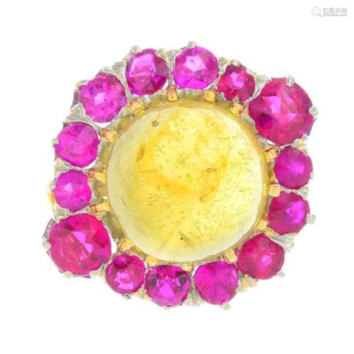 A chrysoberyl and ruby cluster ring. The circular