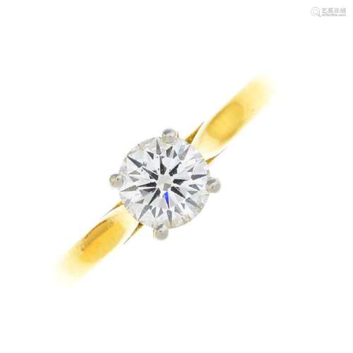 An 18ct gold diamond single-stone ring. Designed as a