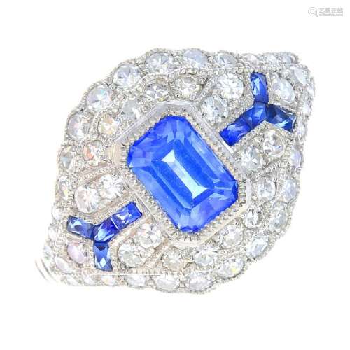 A sapphire and diamond ring. The rectangular-shape