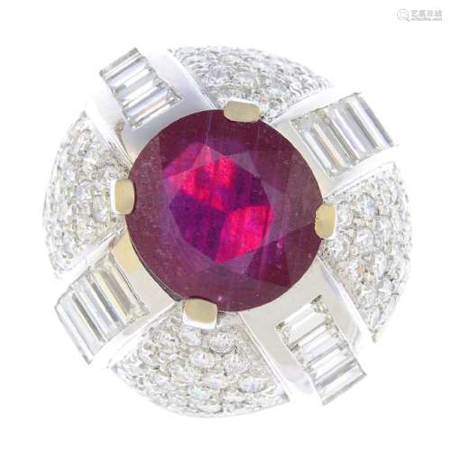A glass-filled ruby and diamond dress ring. The