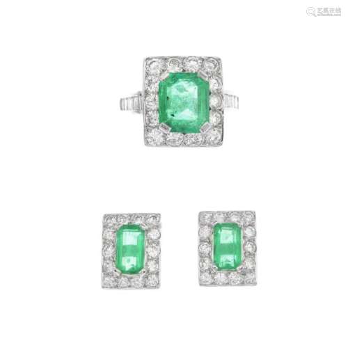 A set of emerald and diamond jewellery. The ring