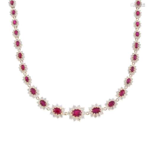 A 9ct gold ruby and diamond necklace. Designed as a