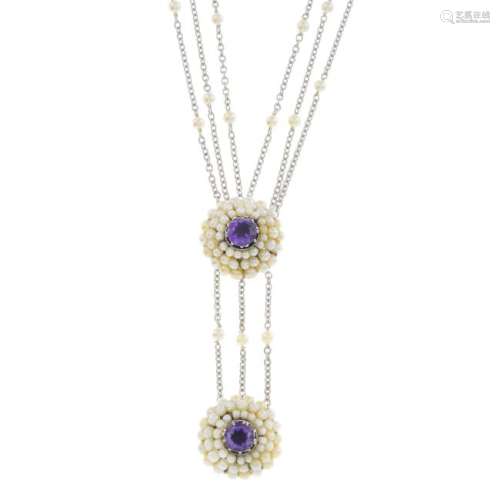 A gold seed pearl and amethyst necklace. The