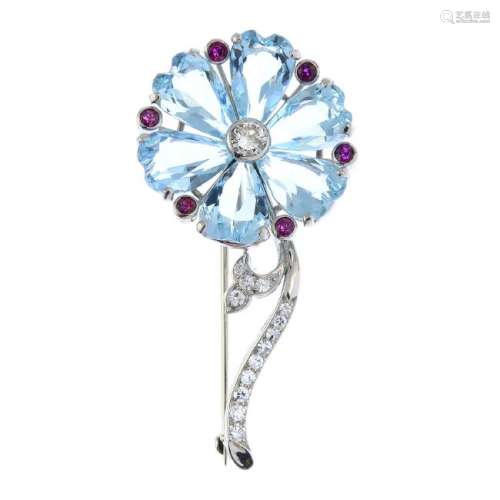 An aquamarine, diamond and ruby brooch. Designed as a