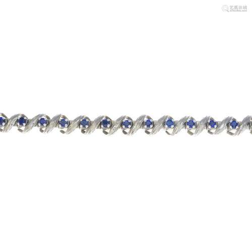 A sapphire bracelet. The circular-shape sapphire line,