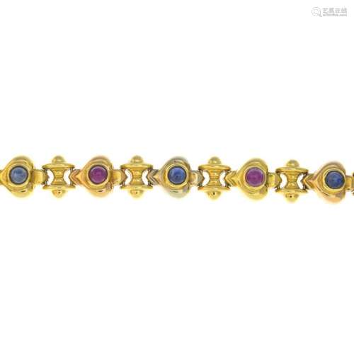 An 18ct gold ruby and sapphire bracelet. Designed as a