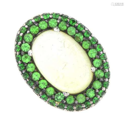 An 18ct gold citrine and tsavorite garnet ring. The