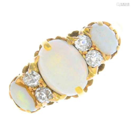 A late Victorian 15ct gold opal three-stone and diamond