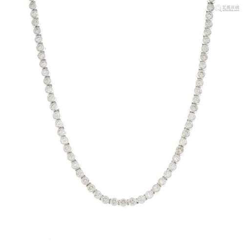 An 18ct gold diamond necklace. Designed as a