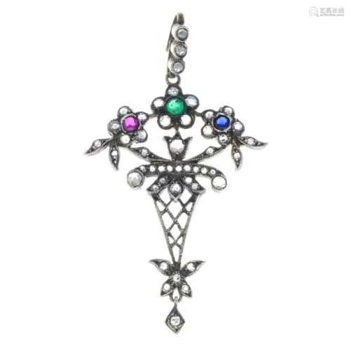 A diamond and gem-set pendant. Designed as a stylised