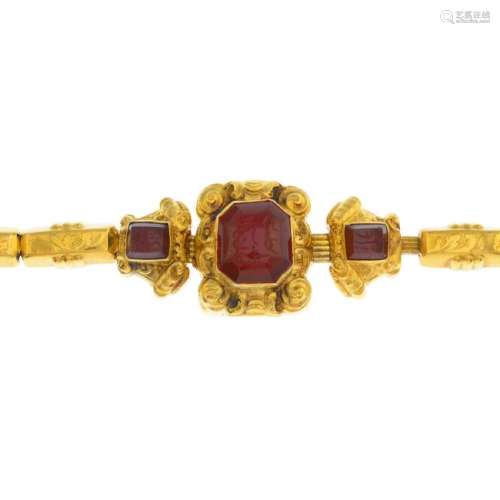 A late 19th century gold carnelian bracelet. Designed
