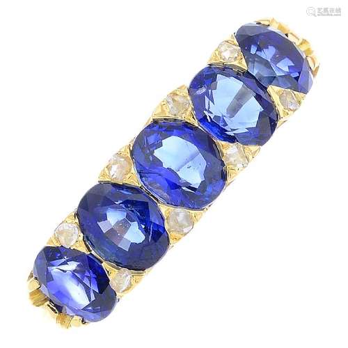 A sapphire five-stone and diamond ring. The oval-shape