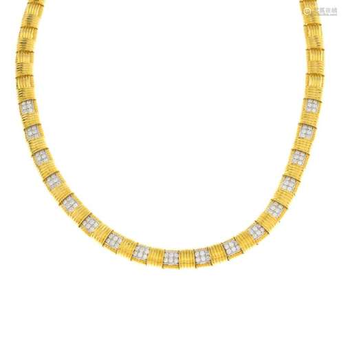 ROBERTO COIN - an 18ct gold diamond necklace.