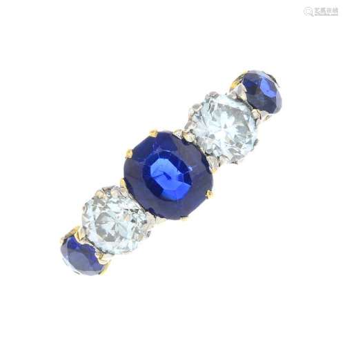 A sapphire and diamond five-stone ring. The alternating