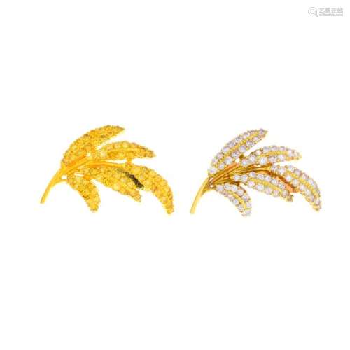 Two coloured diamond brooches. Each designed as a
