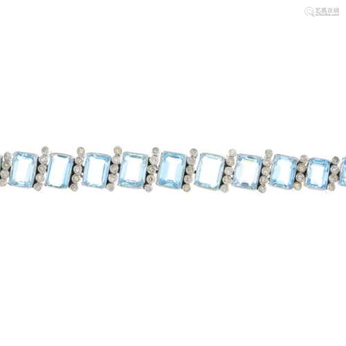 An aquamarine and diamond bracelet. The slightly