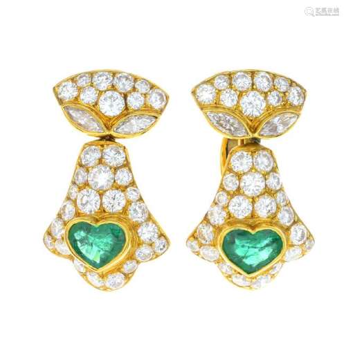 A pair of 18ct gold emerald and diamond earrings. Each