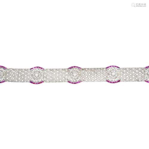 A diamond and ruby bracelet. Designed as a series of