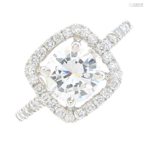 A diamond cluster ring. The brilliant-cut diamond, with