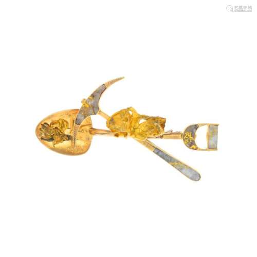 A Victorian gold and marble miner's brooch. The